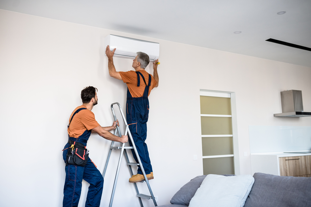 On The Double technician installing a new AC system