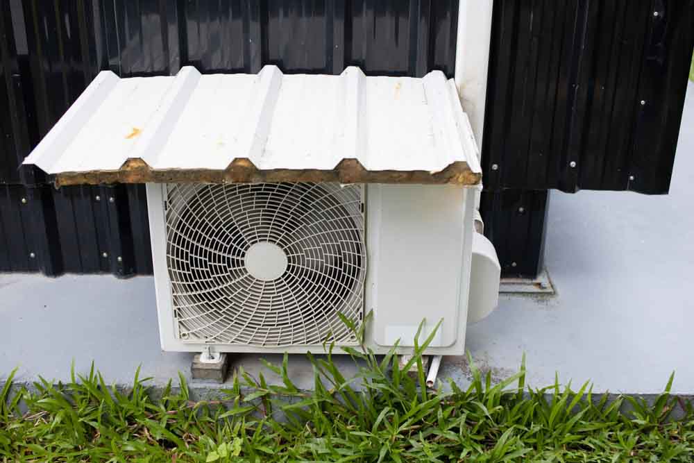 outdoor AC unit in shade